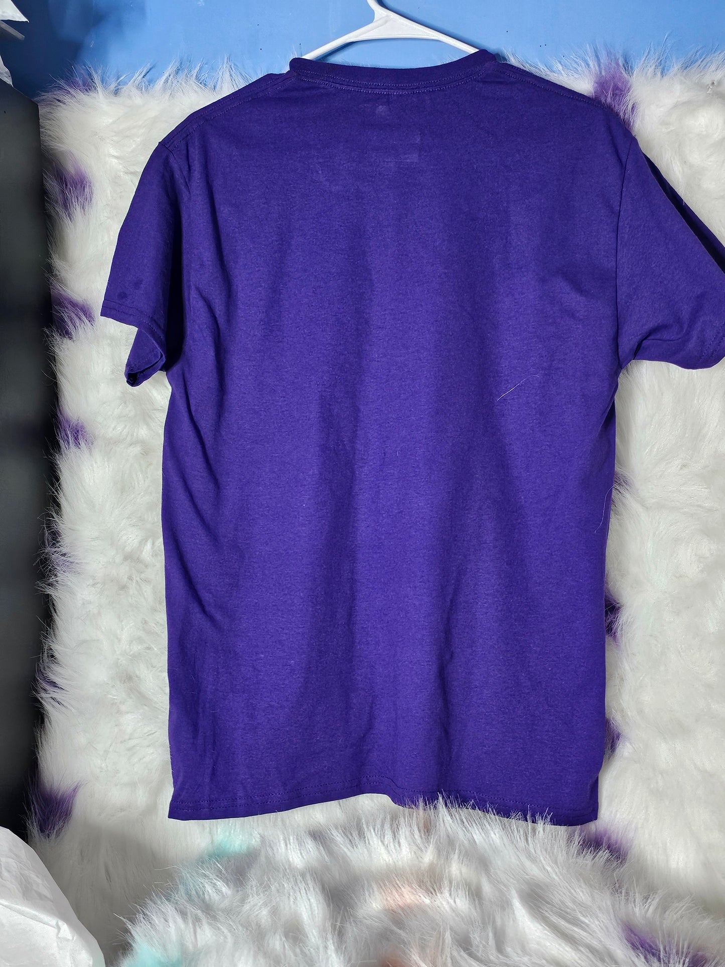 Skull head on purple shirt