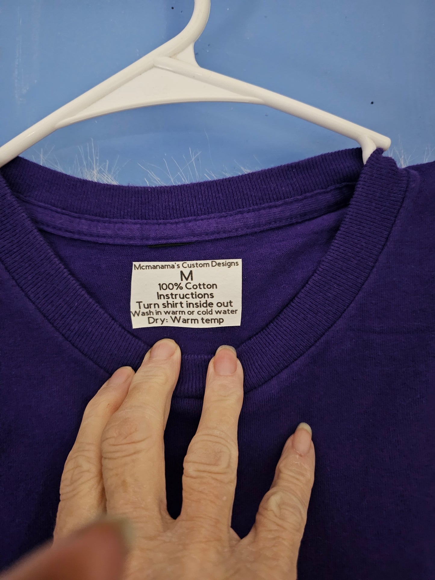 Size M 100% cotton Purple No I don't think Tshirt