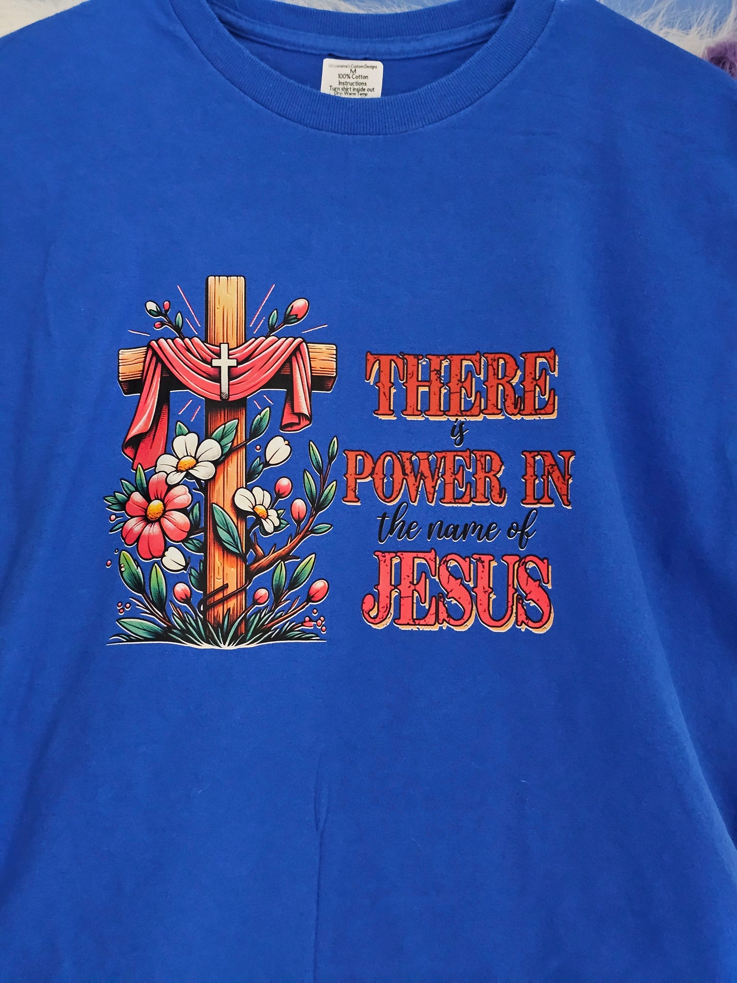 Size M 100% cotton Blue There is power in the name of Jesus Tshirt