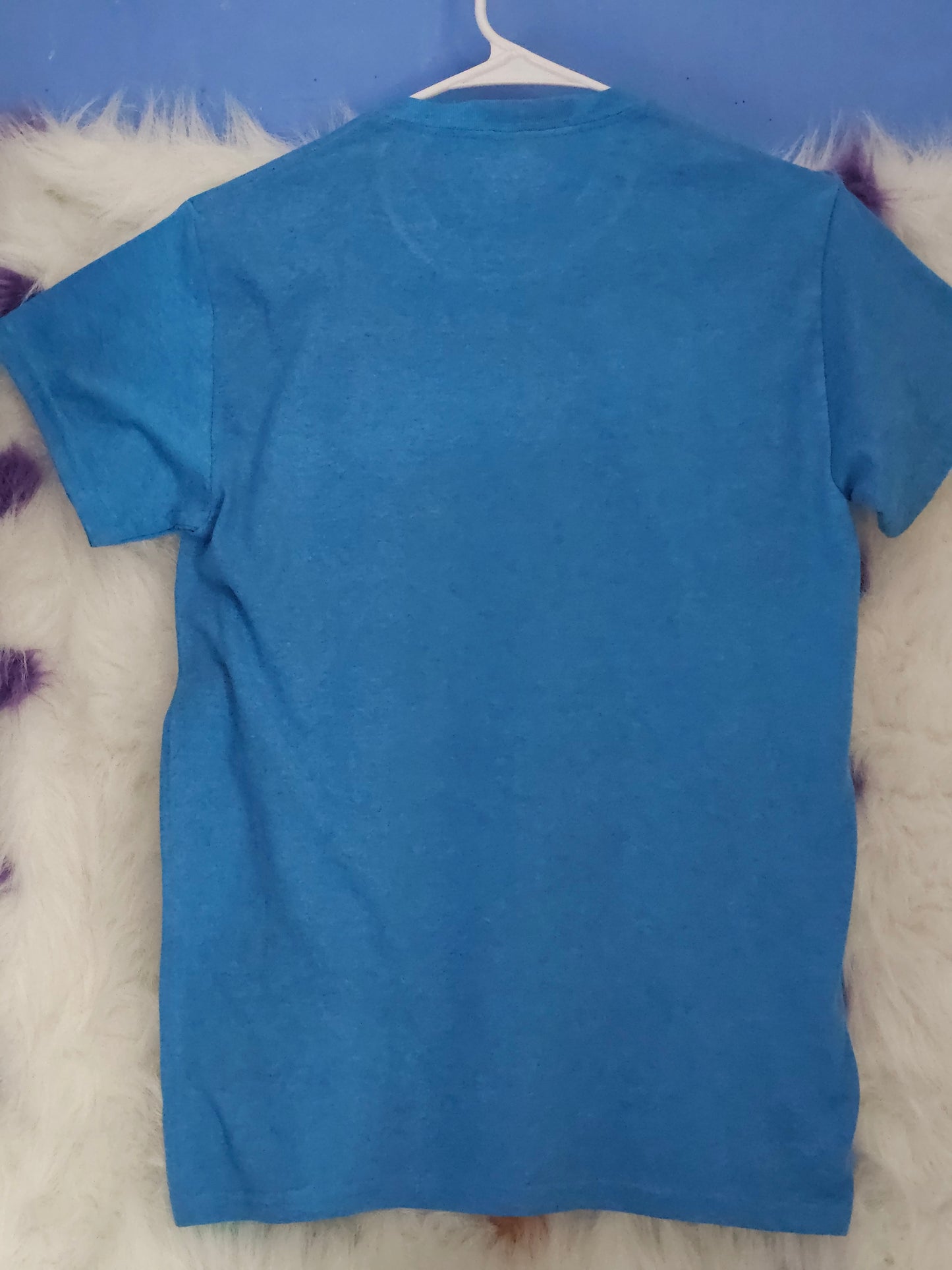 Size S 50% cotton 50%polyester Blue shirt with hearts