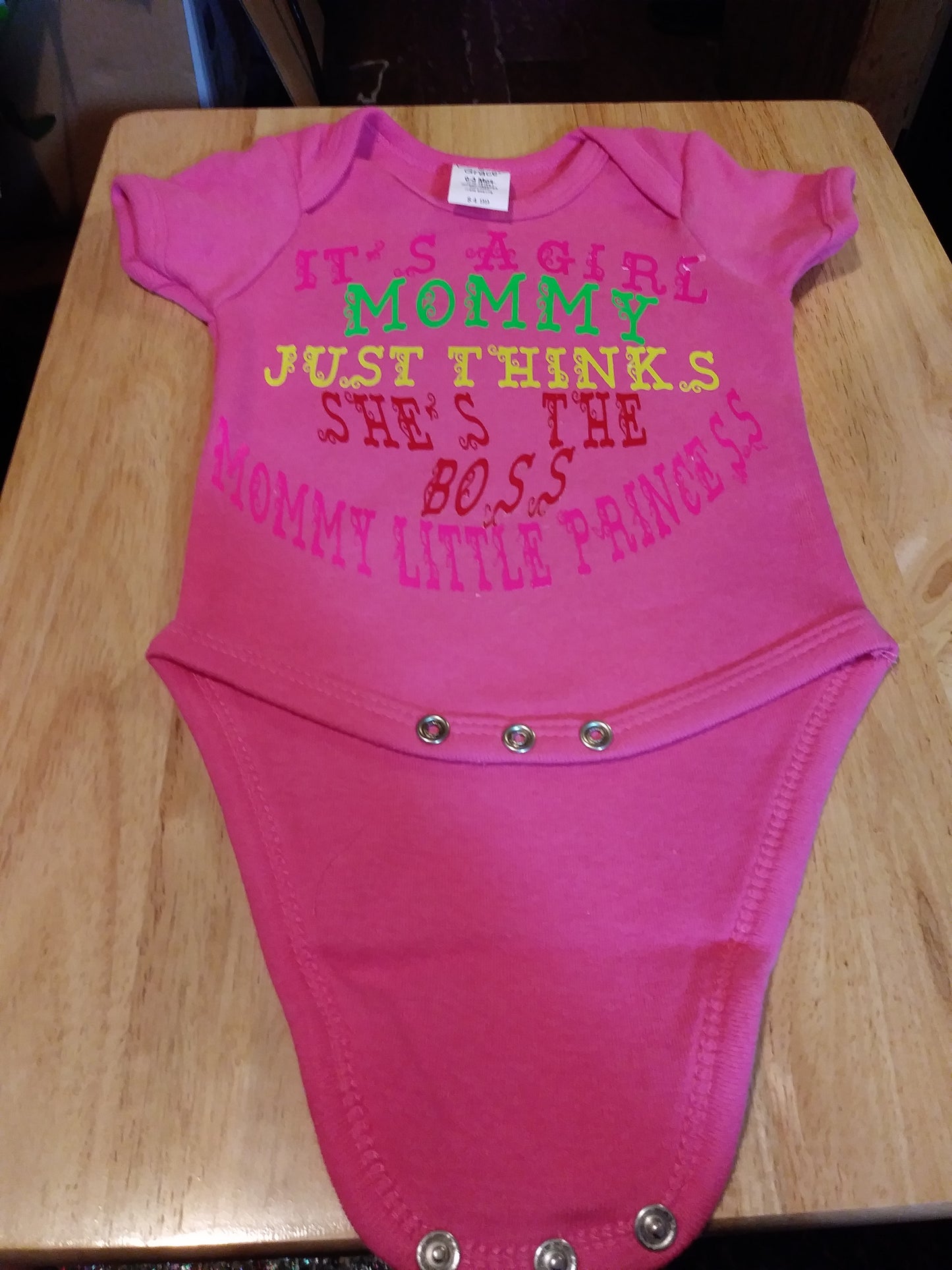 Mommy thinks she's the boss onesies