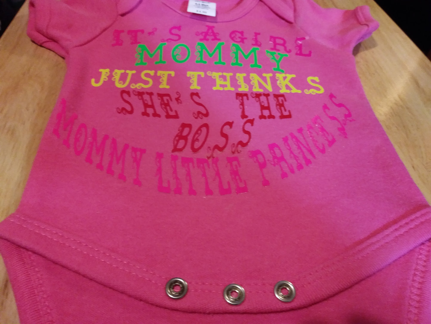 Mommy thinks she's the boss onesies