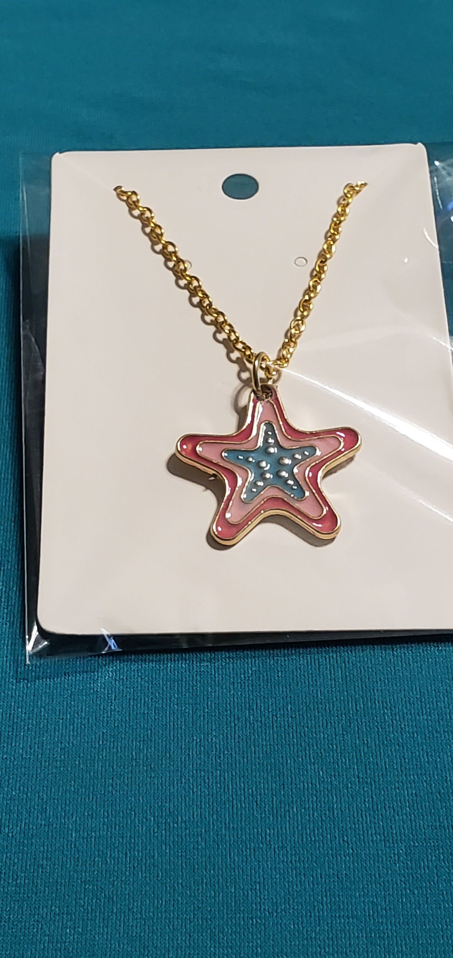 Gold plated star necklace