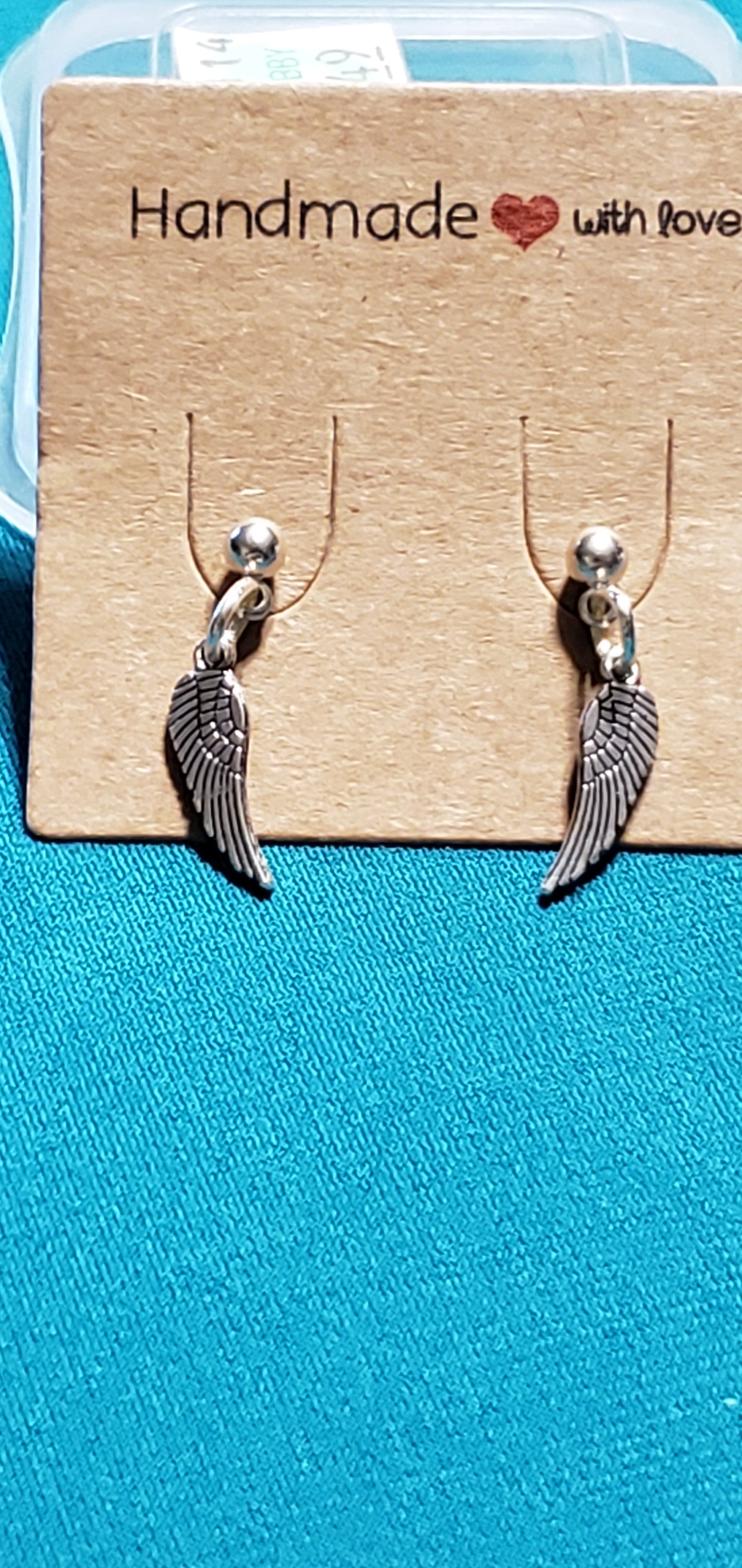 Stainless steel silver plated angel wings post earrings