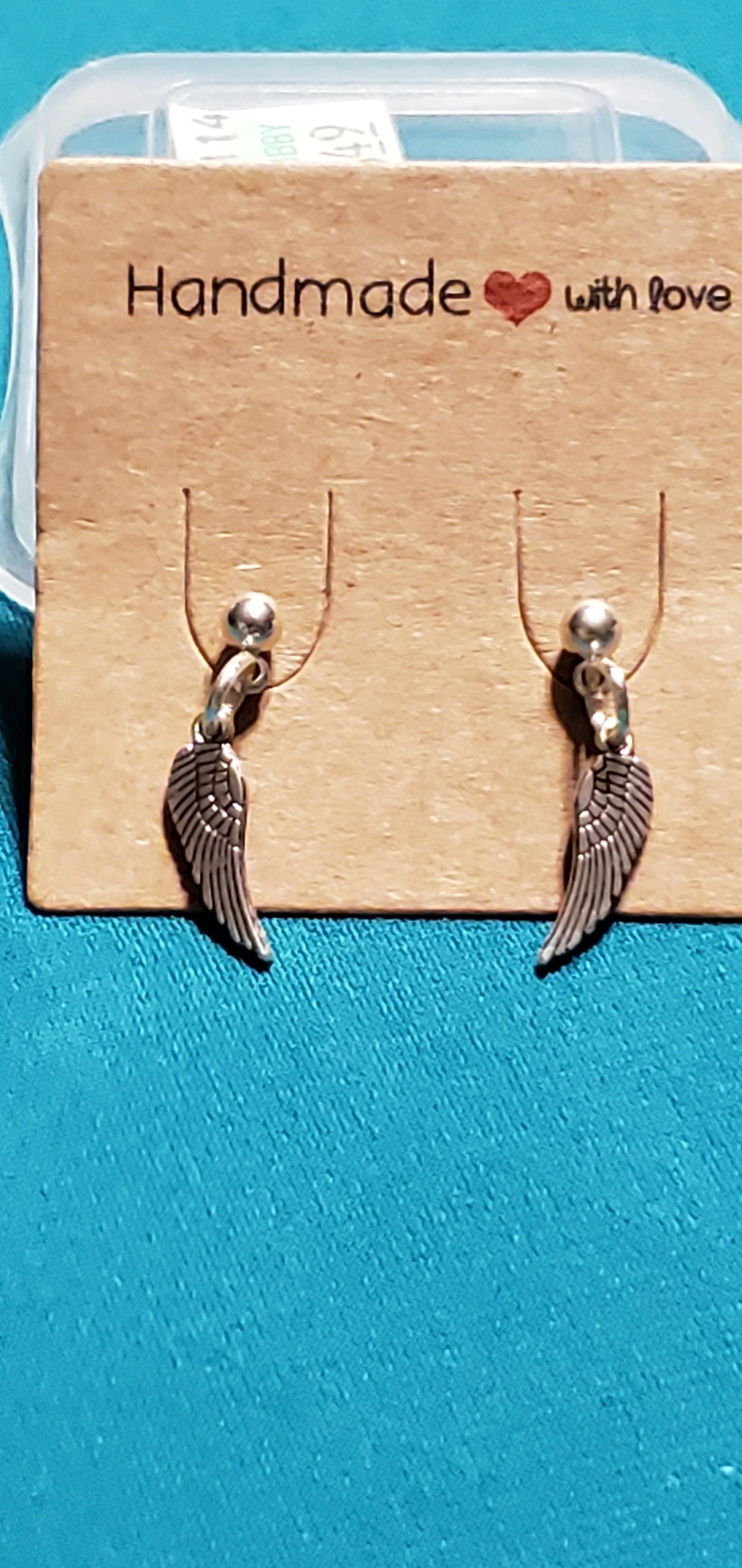 Stainless steel silver plated angel wings post earrings