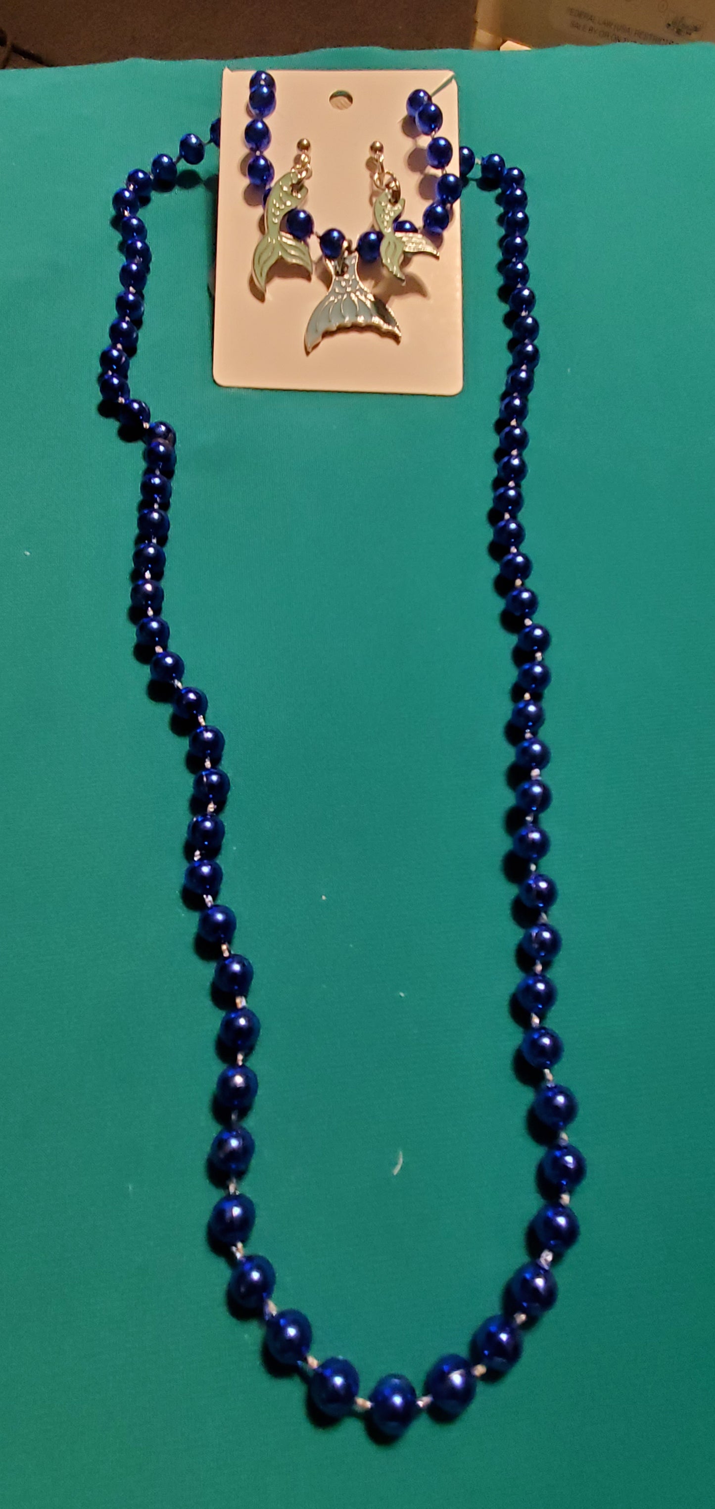 Mermaid tail on blue beaded necklace