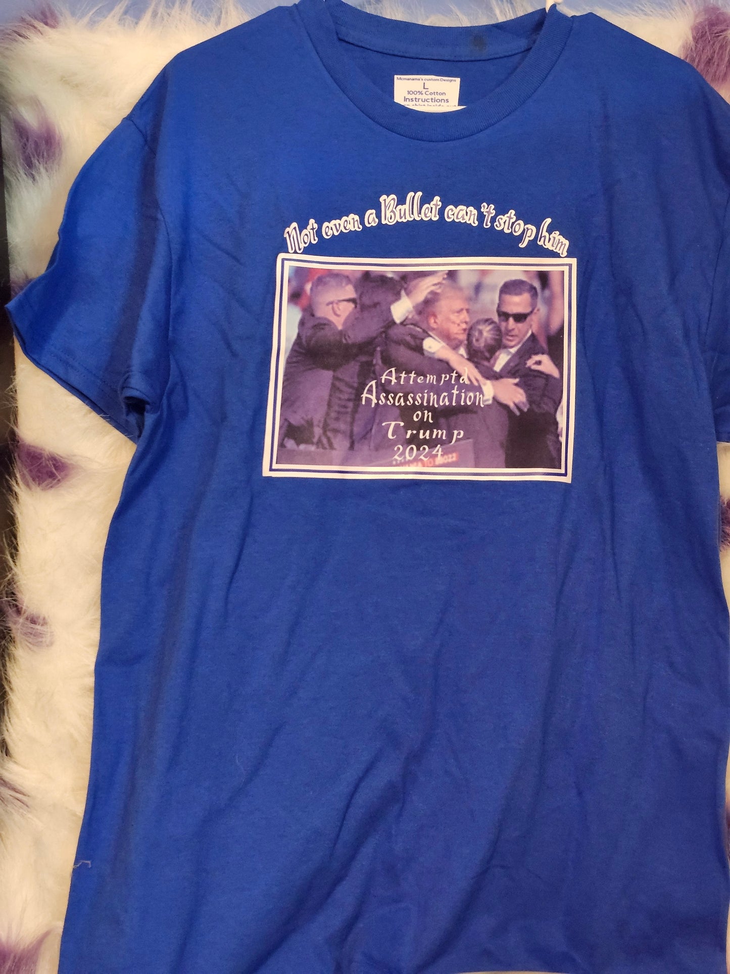 Size L 100% blue cotton Not even a bullet can stop him