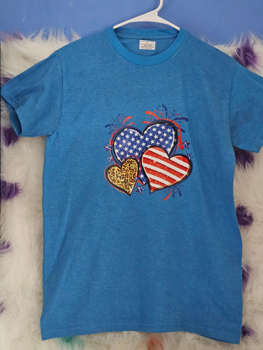 Size S 50% cotton 50%polyester Blue shirt with hearts