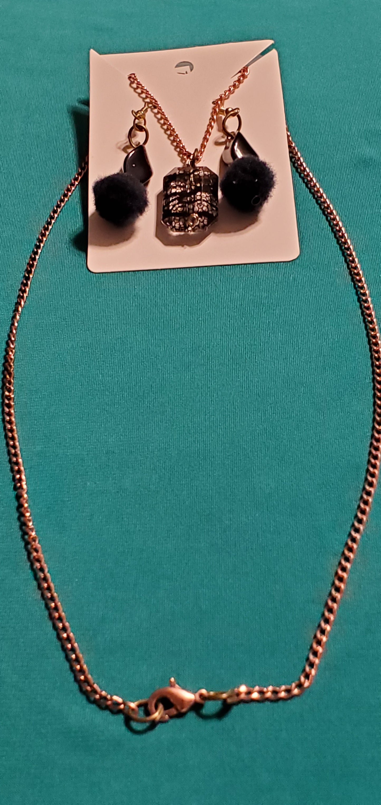Gold plated black stars and fuzzy balls necklace and earrings