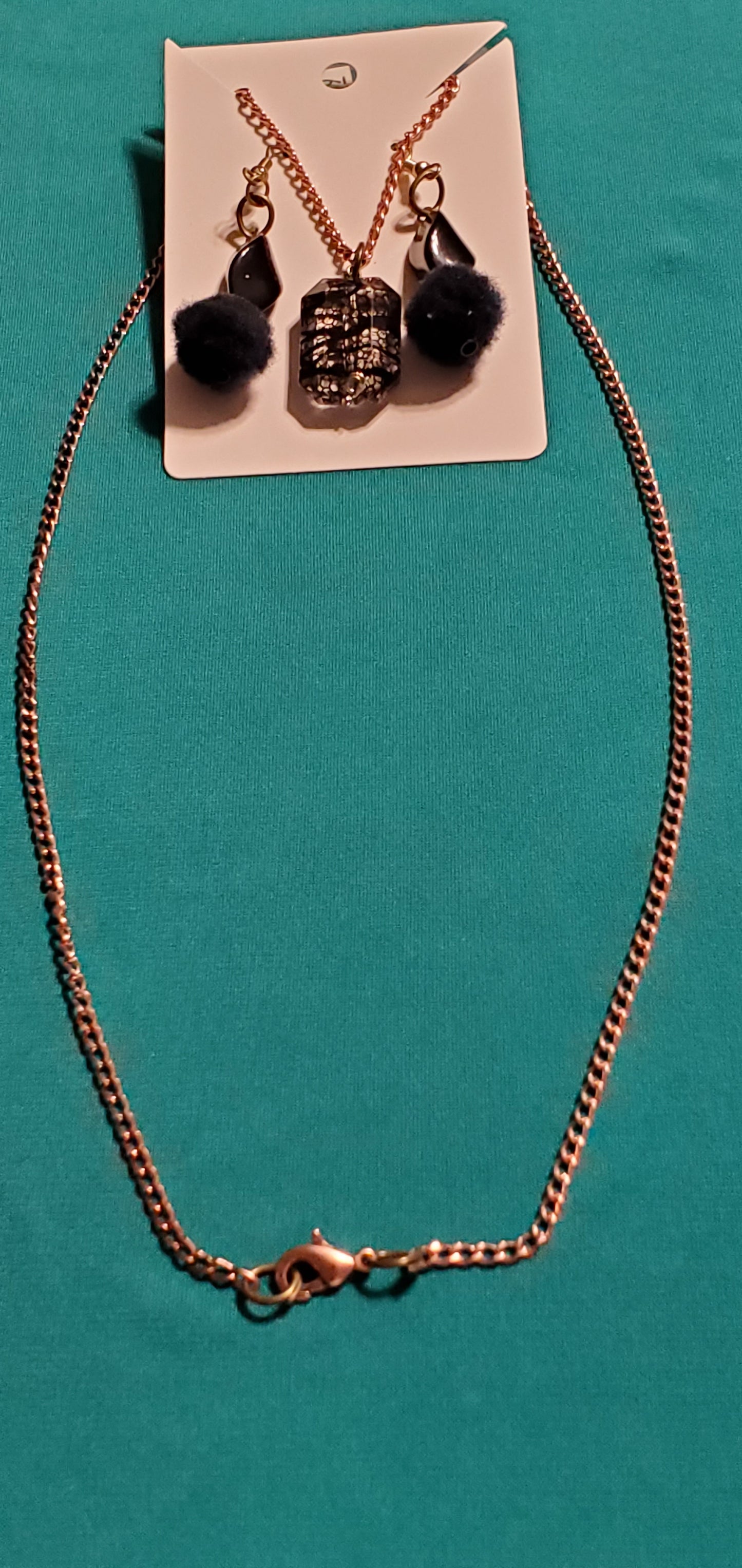 Gold plated black stars and fuzzy balls necklace and earrings