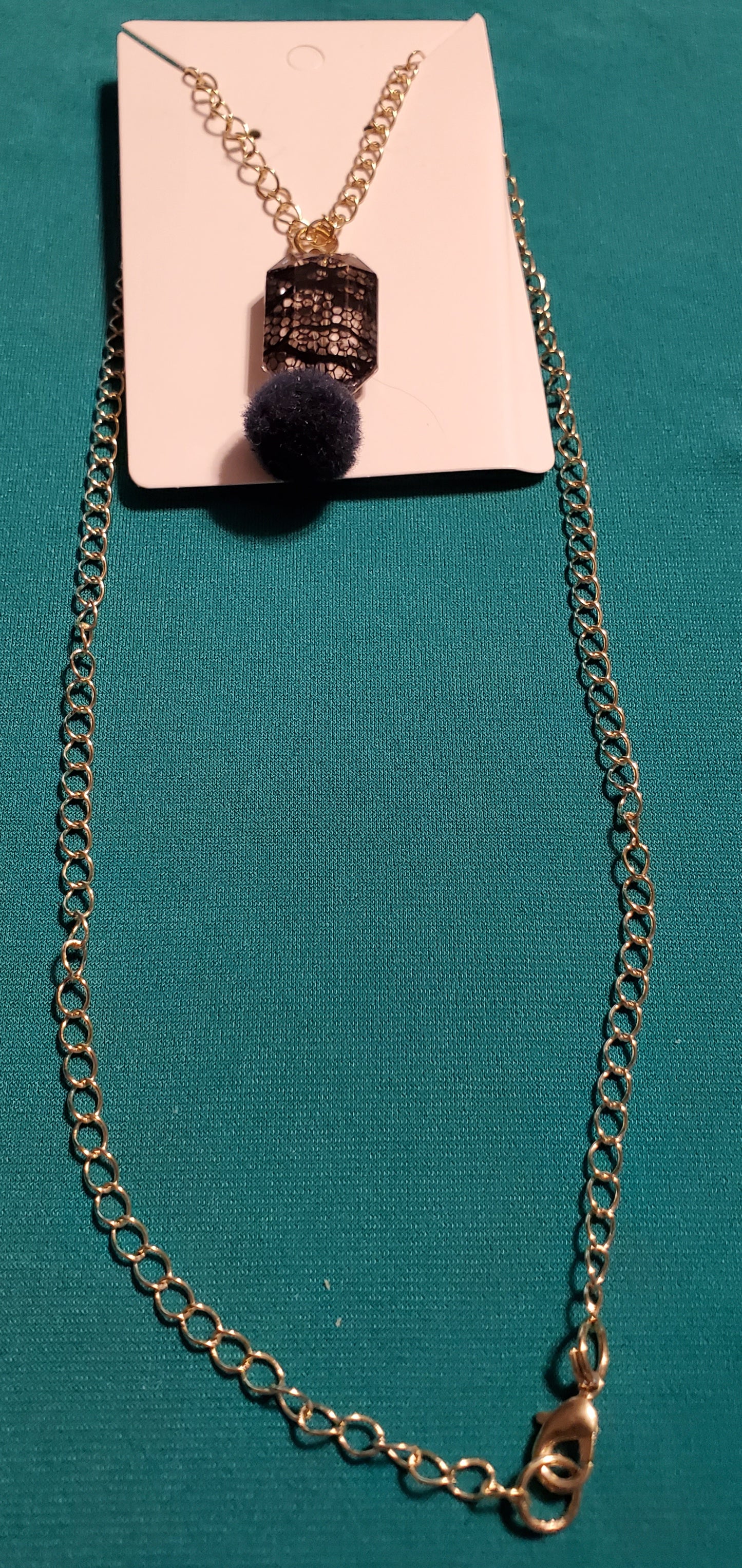 Gold plated black stars and fuzzy balls necklace and earrings